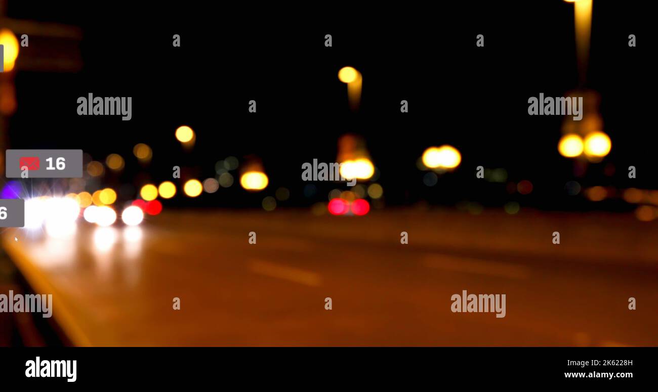 Composto da icona messaggio e numero 16 sulla strada sfocata con luci stradali illuminate di notte Foto Stock