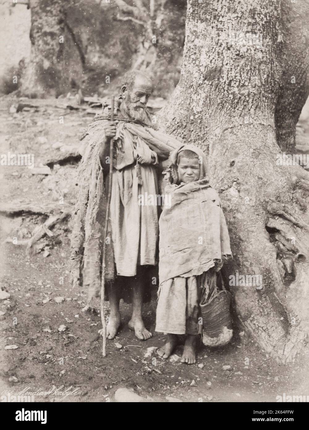 Vintage 19 ° secolo fotografia: Male vestito uomo e bambino, Tunisi, Tunisia, circa 1890's. Foto Stock