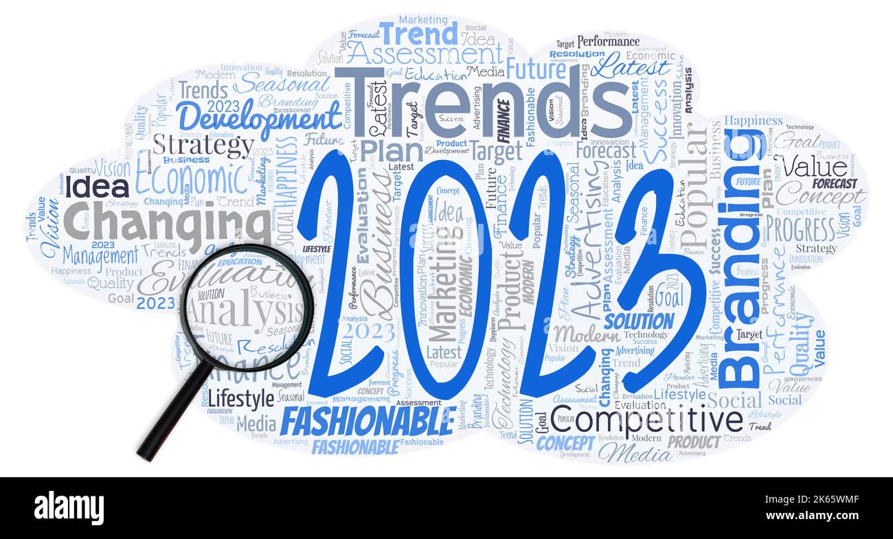 Nuvola di parole grandi a forma di UFO con lente d'ingrandimento con parole Trends 2023. Nuove tendenze 2023 oggetto delle persone ambizione o sforzo obiettivo o desiderato Foto Stock