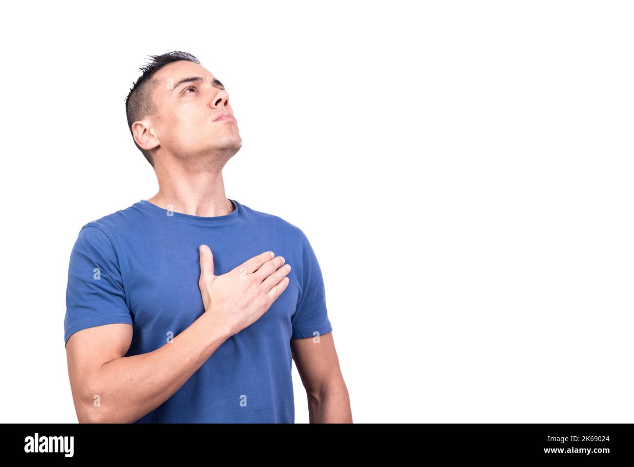 Uomo con la mano sul cuore con orgoglio Foto Stock