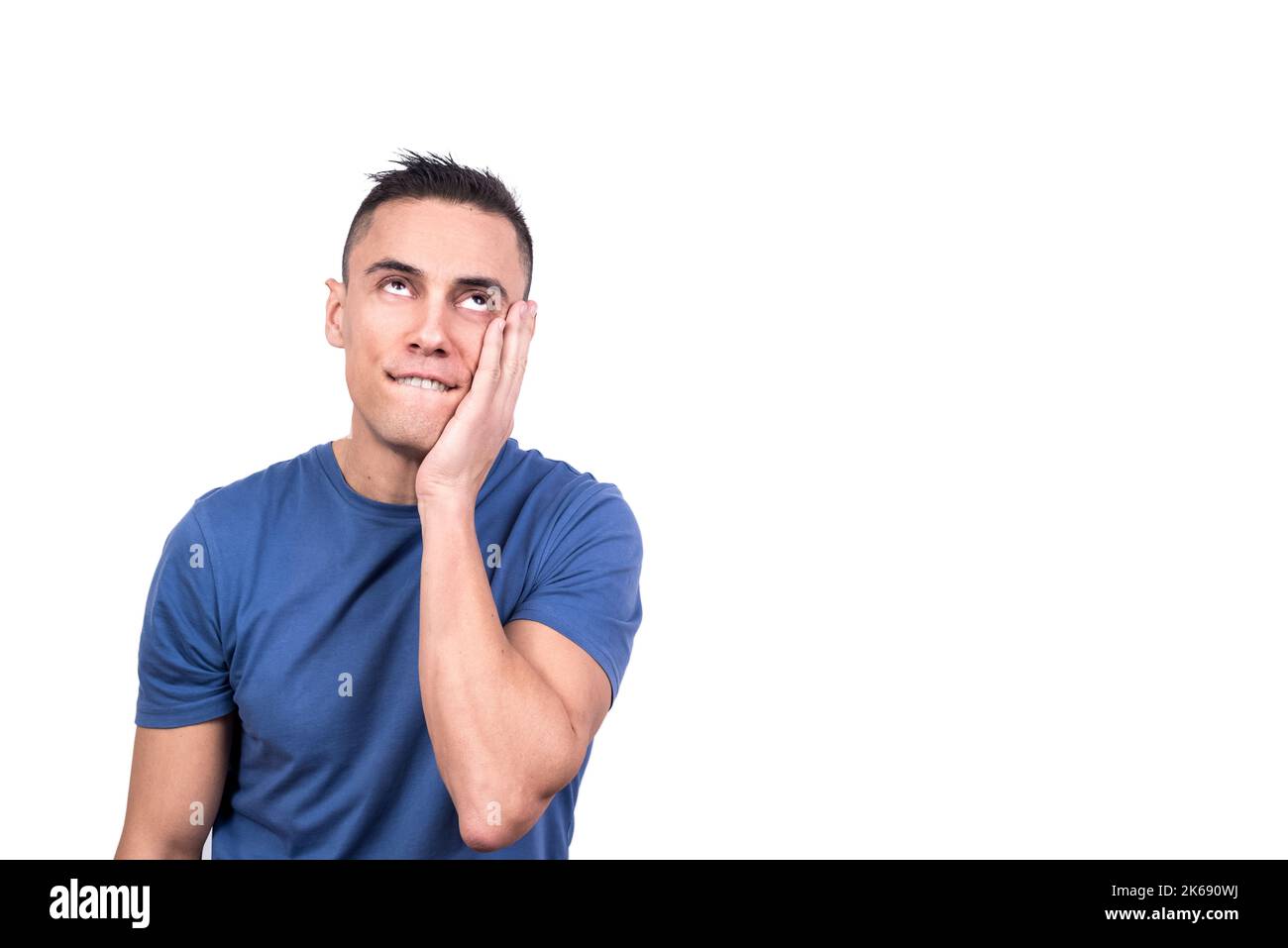 Uomo innamorato con una mano sulla guancia Foto Stock