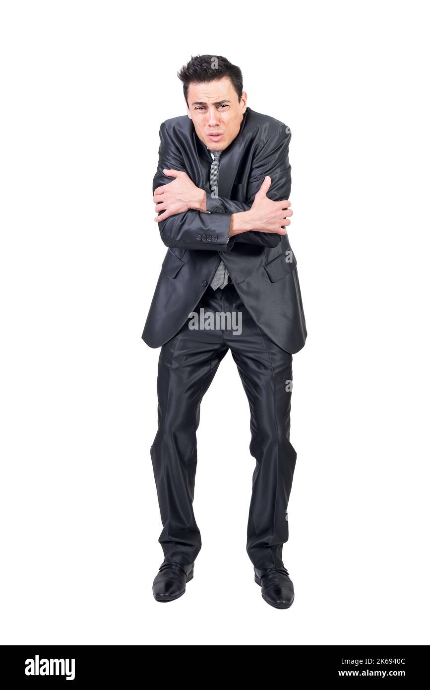 Uomo d'affari che mostra un gesto freddo in studio. Sfondo bianco. Foto Stock