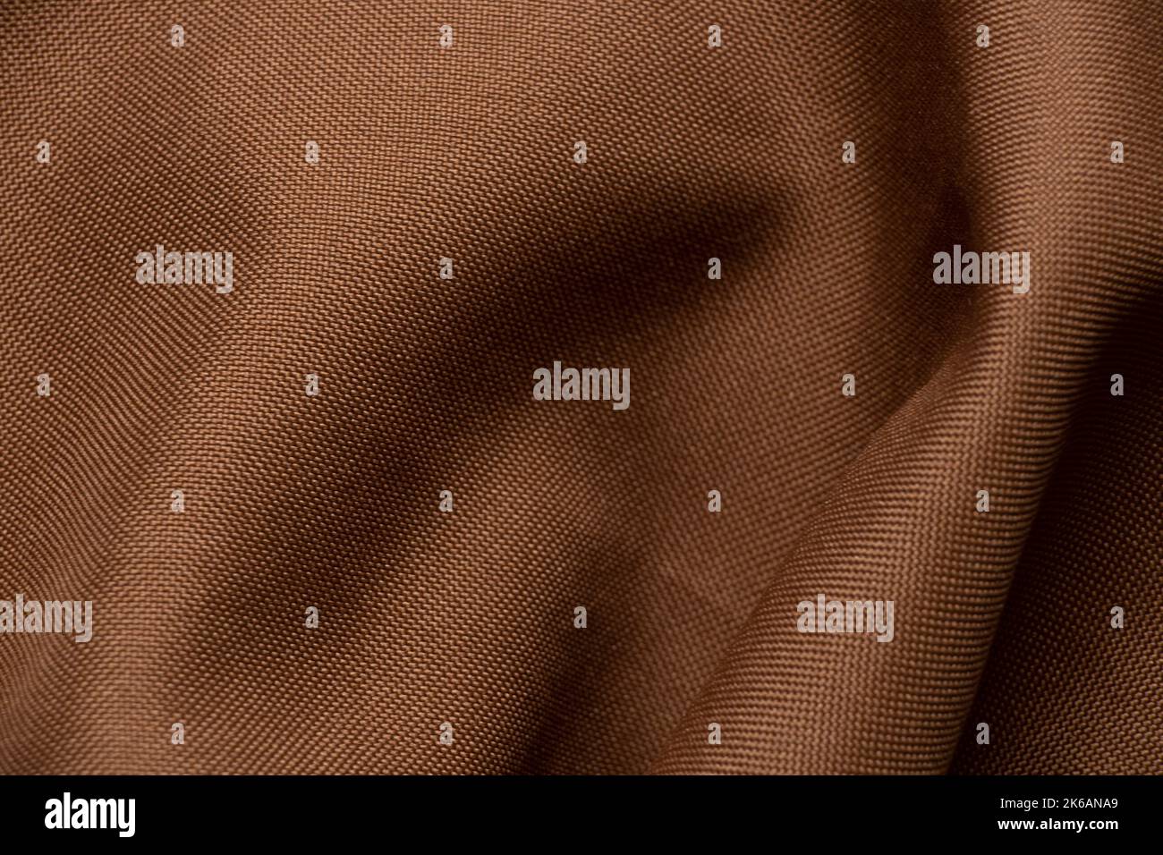 Tessuto marrone chiaro per il primo piano dello sfondo, tessuto per lo sfondo Foto Stock