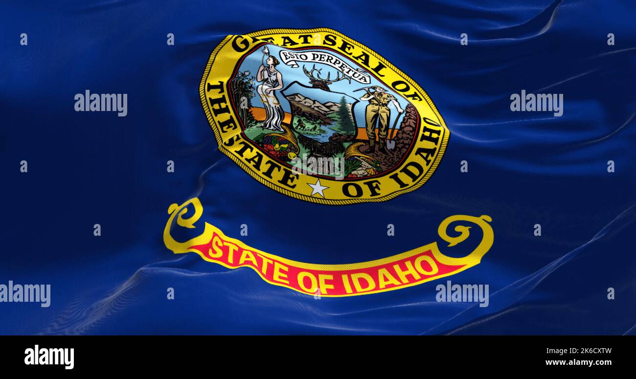 Vista ravvicinata della bandiera di stato dell'Idaho che sventola nel vento. Idaho è uno stato della regione del Pacifico nord-occidentale degli Stati Uniti. Democrazia e spopolamento Foto Stock