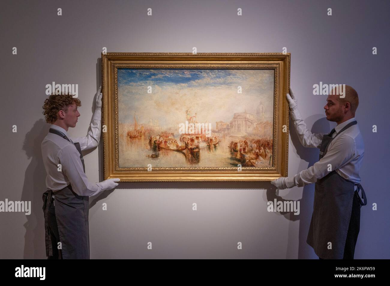 Christie’s, Londra, Regno Unito. 14 ottobre 2022. Opere della proprietà del filantropo e co-fondatore di Microsoft, Paul G. Allen includono capolavori di Paul Cézanne, Georges Seurat, J.M.W. Turner, Edouard Manet, Francis Bacon, Lucian Freud, David Hockney, Wassily Kandinsky e Gerhard Richter saranno venduti all'asta in N.Y. il 9-10 novembre $1 miliardi di vendita a beneficio di cause filantropiche. Immagine: Joseph Mallord William Turner, depositando le tre immagini di John Bellini a la Chiesa Redentore, Venezia, si stima che superino i 30.000.000 dollari. Credit: Malcolm Park/Alamy Live News. Foto Stock