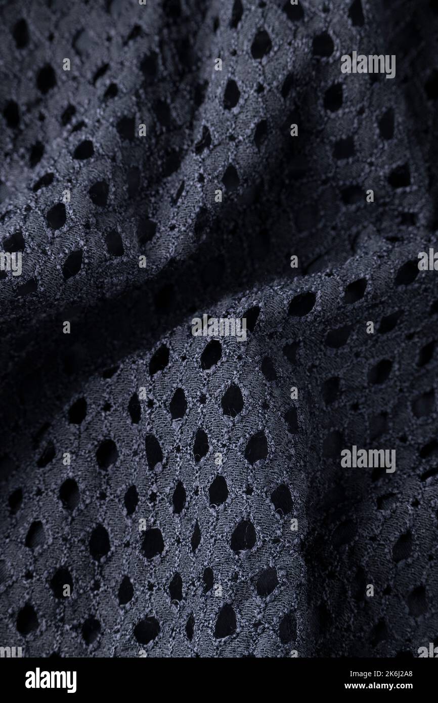 Elegante panno nero, ondulato moderno tessuto vista ravvicinata Foto Stock