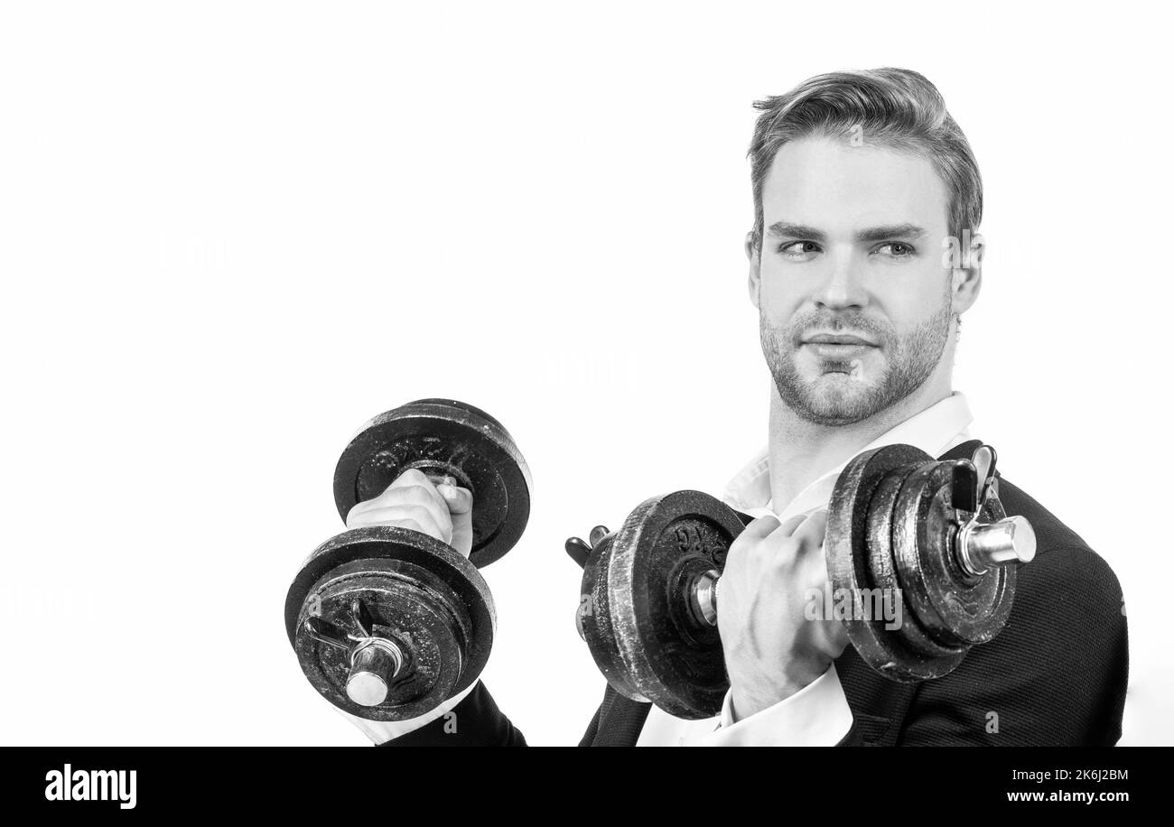 Fitness per affari. Uomo d'affari fare allenamento dumbell. L'uomo tiene i pesi a mano. Fitness fisico Foto Stock
