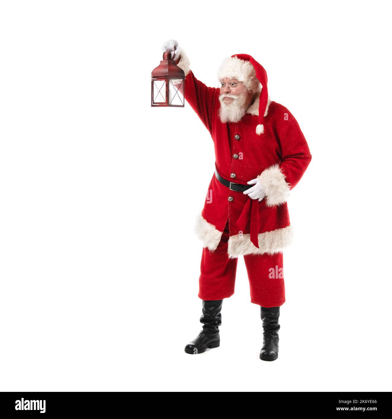 Babbo Natale con lanterna isolata su sfondo bianco Foto Stock