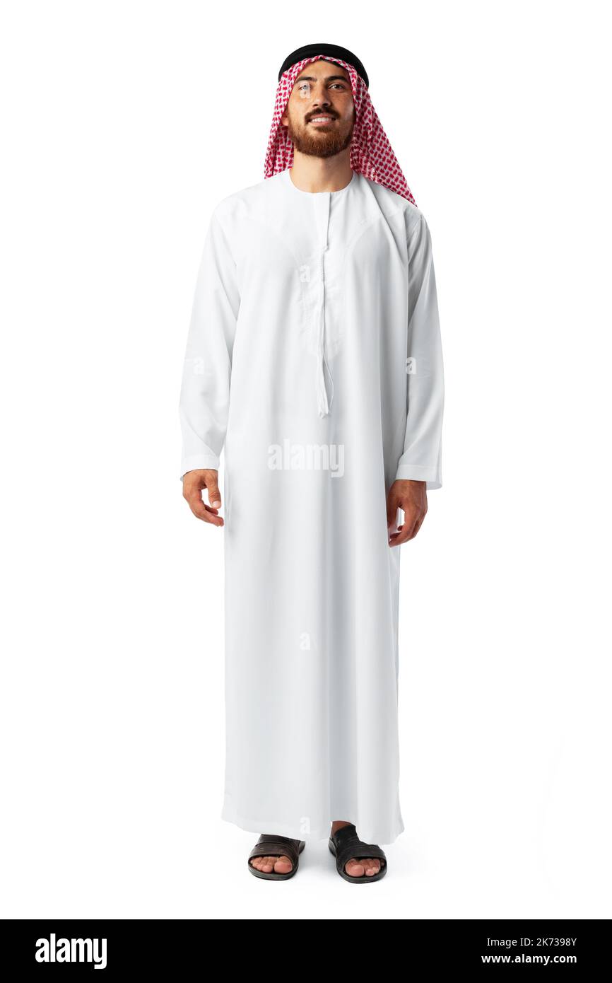 Sorridendo un uomo arabo mentre si è in piedi in uno studio bianco Foto Stock