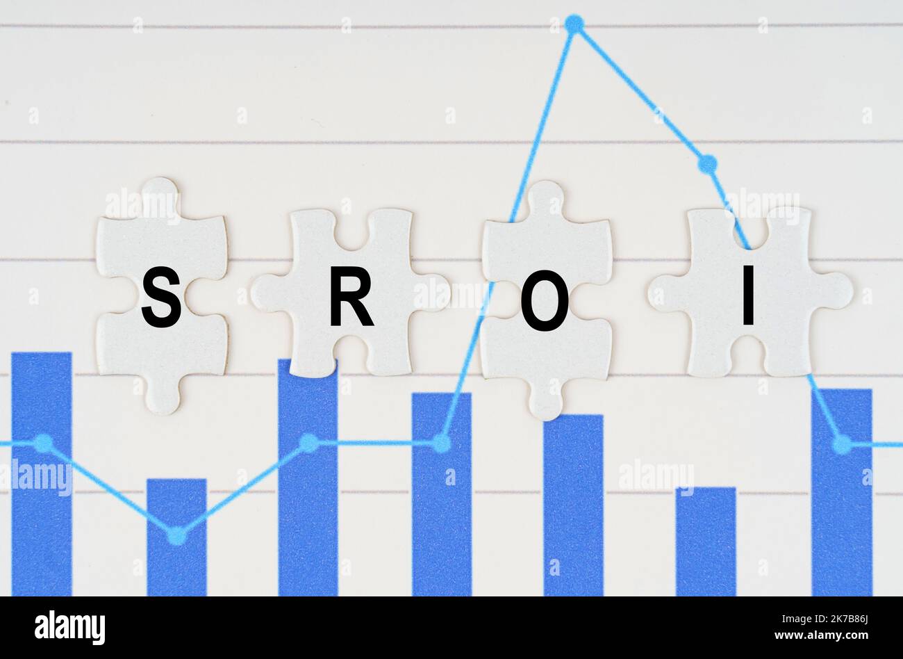 Concetto aziendale. Sui rapporti di affari - i diagrammi sono puzzle con l'iscrizione - SROI Foto Stock