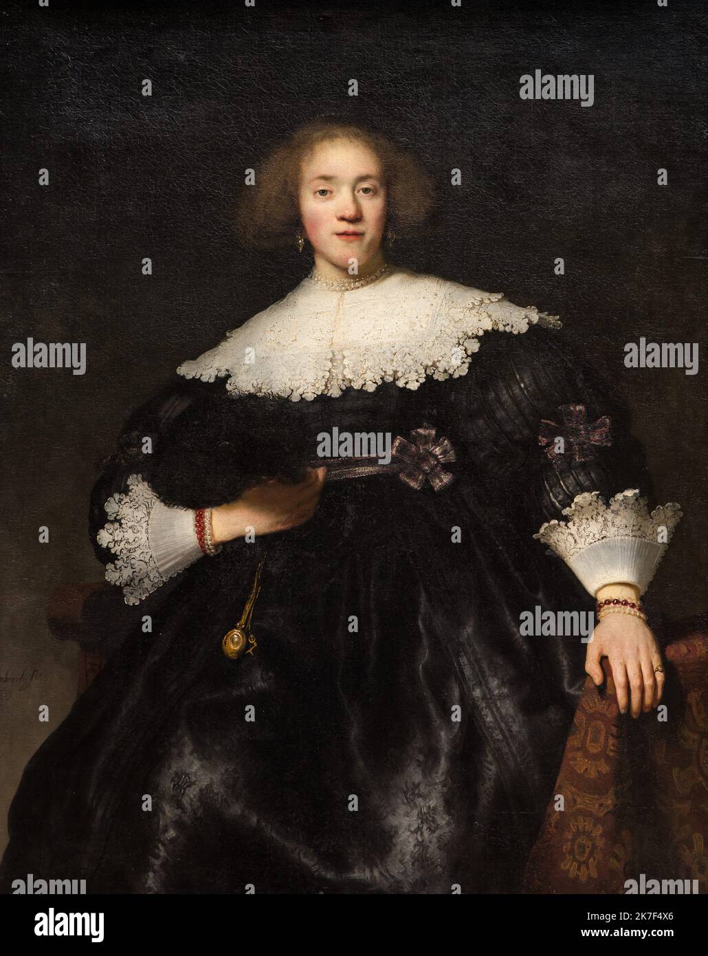 ©Active Museu/MAXPPP - ActiveMuseum 0000543.jpg / Ritratto d'une jeune femme avec un ventilateur - Rembrandt (1633) - 1633 - / Rembrandt Harmenszeon van Rijn (Rembrandt) / Museo della Peintura attiva / le Pictorium barocco, collare, orecchino, ventilatore, Rembrandt, verticale, giovane donna, 17th ° secolo, Rembrandt van Harmenszod (Rembrandt) Foto Stock