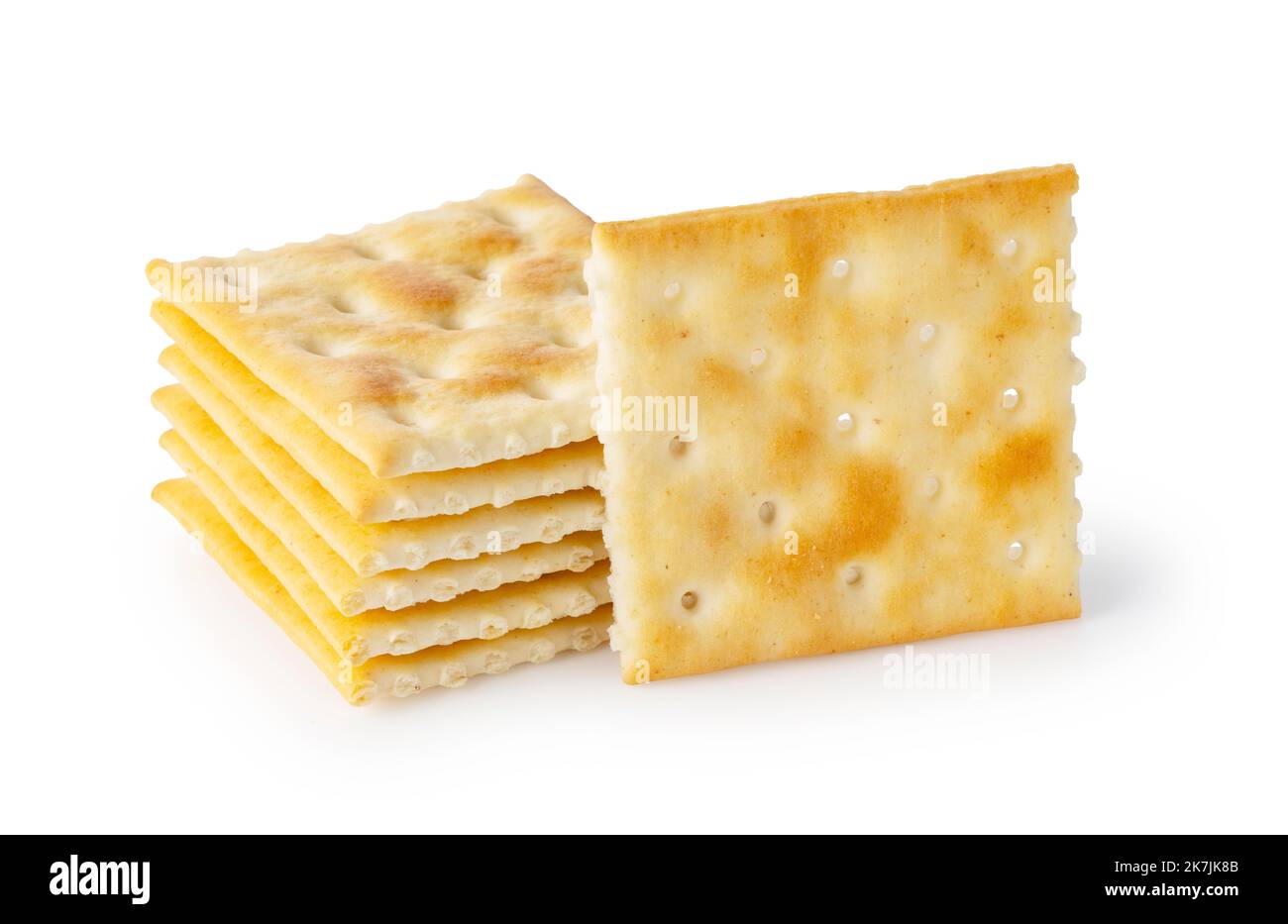 Cracker posti uno sopra l'altro su uno sfondo bianco. Foto Stock