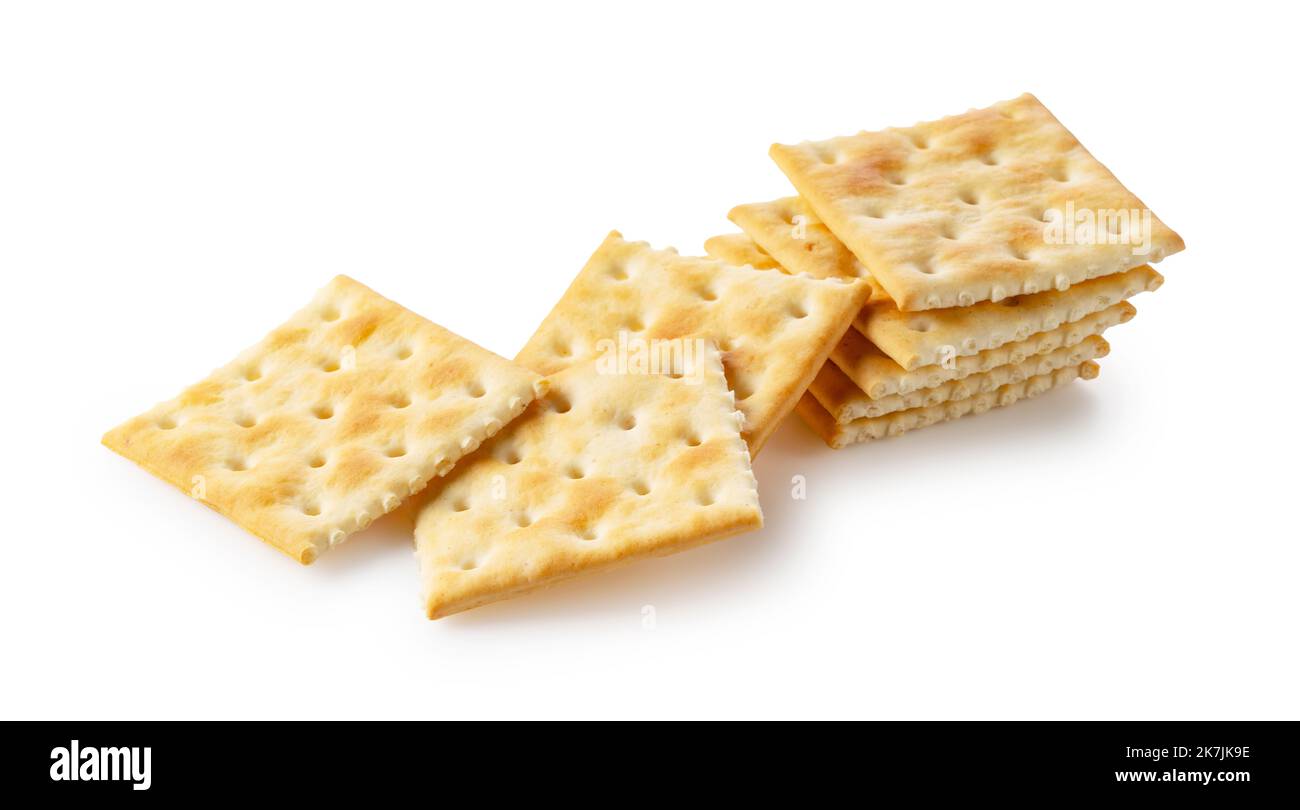 Cracker posti uno sopra l'altro su uno sfondo bianco. Foto Stock