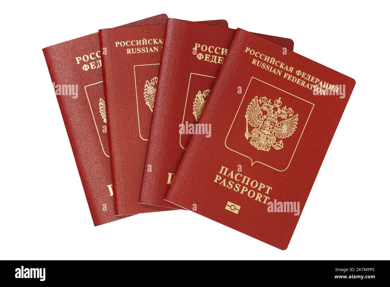 Quattro passaporti stranieri russi su uno sfondo bianco isolato Foto Stock