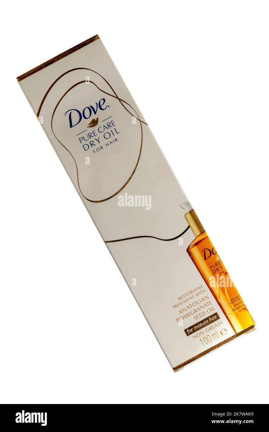 Scatola di dove pure Care olio secco per capelli trattamento rigenerativo con olio di semi di melograno anatoliano per capelli maturi isolato su fondo bianco Foto Stock