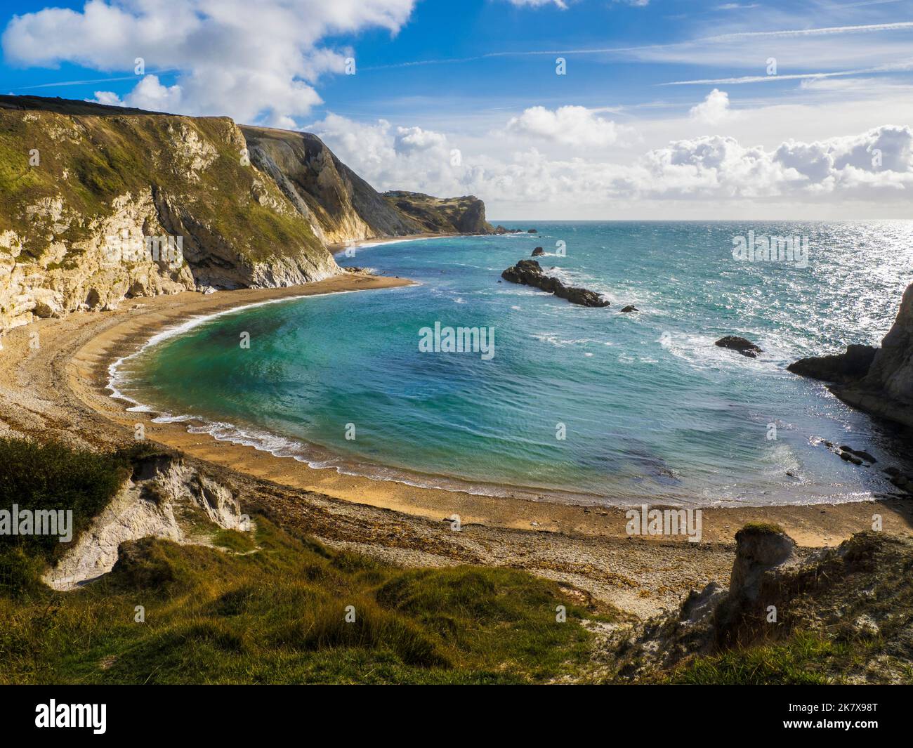 Vista su Man o'War Beach e St Oswald's Bay a Dorset. Foto Stock