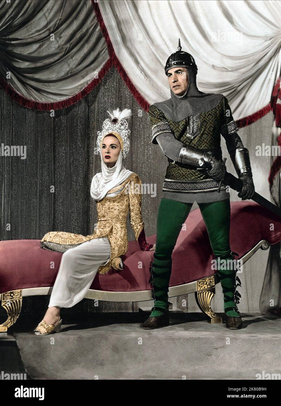 Ann Blyth & David Farrar Film: The Golden Horde (USA 1951) personaggi: Principessa Shalimar & Sir Guy del Devon regista: George Sherman 01 ottobre 1951 **AVVERTENZA** questa fotografia è solo per uso editoriale ed è copyright di IMMAGINI UNIVERSALI e/o del fotografo assegnato dalla Film o dalla Production Company e può essere riprodotta solo da pubblicazioni in concomitanza con la promozione del film di cui sopra. È richiesto un credito obbligatorio per LE FOTO UNIVERSALI. Il fotografo deve essere accreditato anche quando è noto. Nessun uso commerciale può essere concesso senza autorizzazione scritta da parte della Film Company. Foto Stock