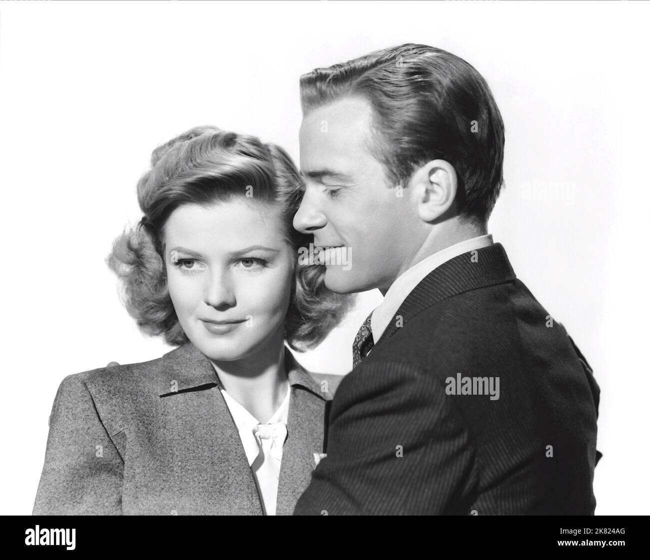 Jean Rogers & Richard Carlson Film A Stranger in Town (1948) personaggi: Lucy Gilbert, Bill Adams regista: Roy Rowland 01 April 1943 **WARNING** questa fotografia è solo per uso editoriale ed è copyright di METRO e/o fotografo assegnato dalla Film o Production Company e può essere riprodotta solo da pubblicazioni in concomitanza con la promozione del suddetto Film. È richiesto un credito obbligatorio per LA METROPOLITANA. Il fotografo deve essere accreditato anche se conosciuto. Nessun uso commerciale può essere concesso senza l'autorizzazione scritta di The Film Company. Foto Stock