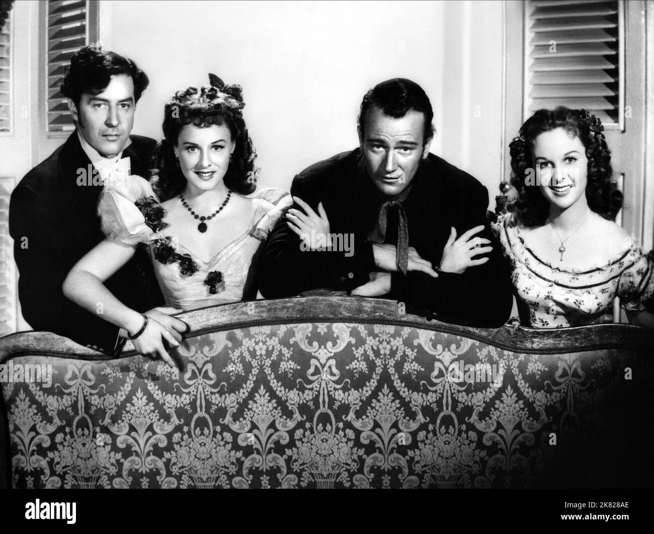 Ray Milland, Paulette Goddard, John Wayne & Susan Hayward Film: Reap the Wild Wind (USA 1942) personaggi: Stephen 'Steve' Tolliver, Loxi Claiborne, Capitano Jack Stuart, cugino Drusilla Alston / Verfilmung eines Zeitungsartikels (basato su Una storia del sabato sera di Thelma Strabel) regista: Demille 18 marzo 1942 **AVVERTENZA** questa fotografia è esclusivamente per uso editoriale ed è copyright delle IMMAGINI DI PRIMARIA IMPORTANZA e/o del fotografo assegnato dalla Film o dalla Società di produzione e può essere riprodotta solo da pubblicazioni in concomitanza con la promozione del film di cui sopra. Un uomo Foto Stock