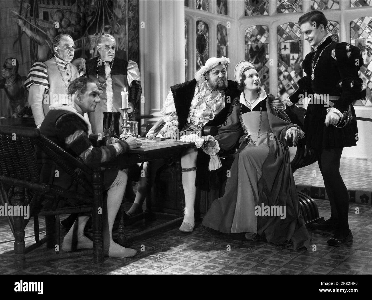 Charles Laughton, Binnie Barnes & Robert Donat Film: La vita privata di Enrico VIII. (USA 1933) personaggi: Re Enrico VIII, Katherine Howard e Thomas Culpeper regista: Alexander Korda 17 agosto 1933 **AVVERTENZA** questa fotografia è solo per uso editoriale ed è copyright di UNITED ARTISTS e/o del fotografo assegnato dalla Film o dalla Production Company e può essere riprodotta solo da pubblicazioni in concomitanza con la promozione del film di cui sopra. È richiesto un credito obbligatorio per GLI ARTISTI UNITI. Il fotografo deve essere accreditato anche quando è noto. Nessun uso commerciale può essere concesso senza Foto Stock