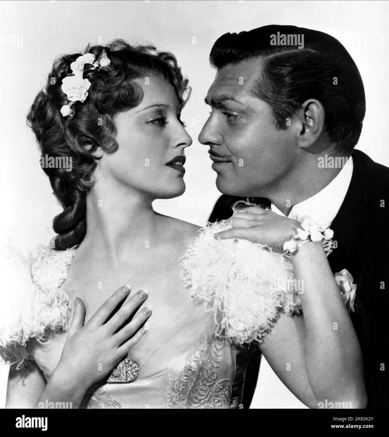 Jeanette Macdonald & Clark Gable Film: San Francisco (1931) personaggi: Mary Blake, Blackie Norton regista: W.S. Van Dyke 26 giugno 1936 **AVVERTENZA** questa fotografia è solo per uso editoriale ed è copyright di MGM e/o del fotografo assegnato dalla Film o dalla Production Company e può essere riprodotta solo da pubblicazioni in concomitanza con la promozione del film di cui sopra. È richiesto un credito obbligatorio a MGM. Il fotografo deve essere accreditato anche quando è noto. Nessun uso commerciale può essere concesso senza autorizzazione scritta da parte della Film Company. Foto Stock