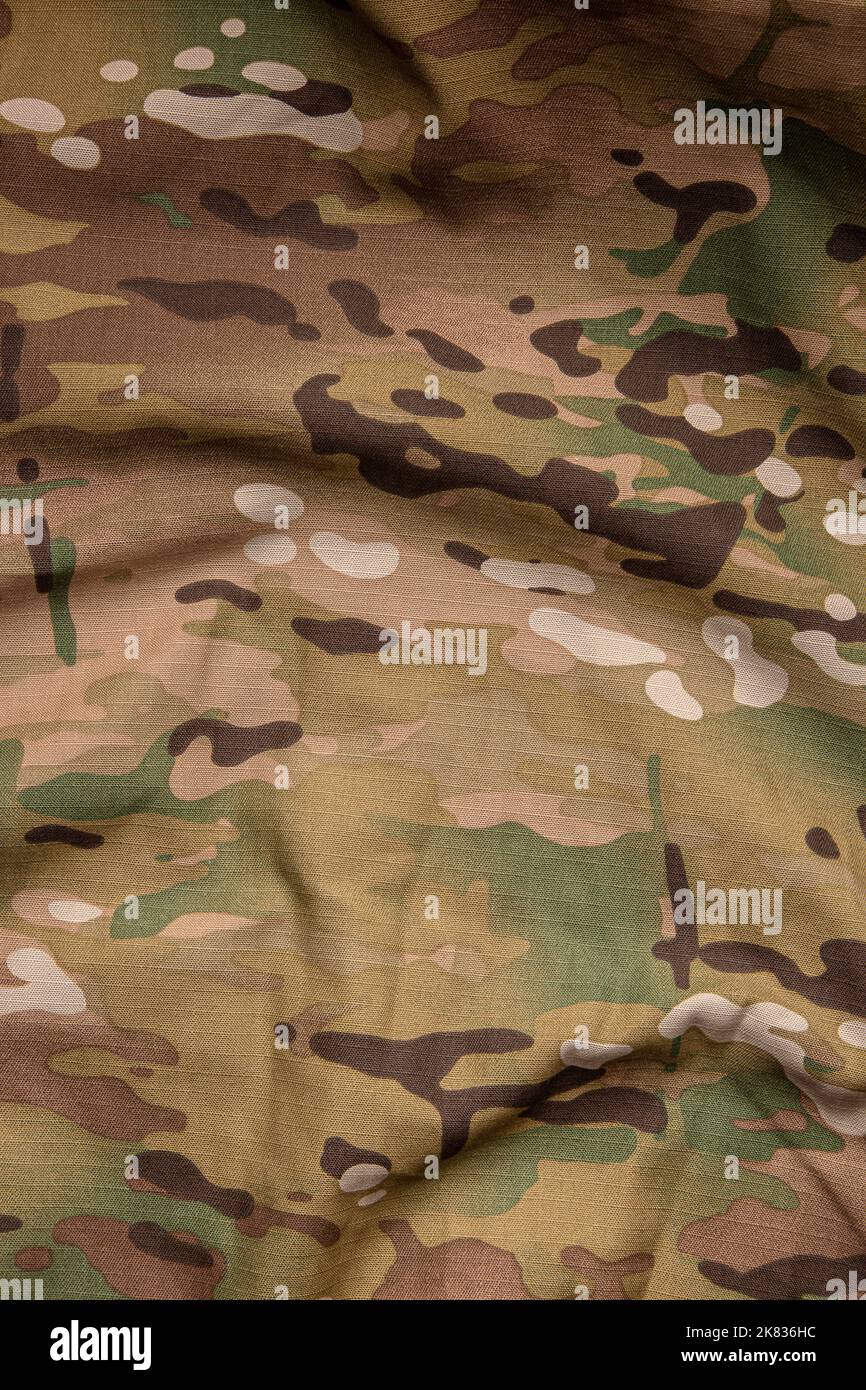 Forza armata multicolore tessuto mimetizzato sfondo texture. Foto Stock