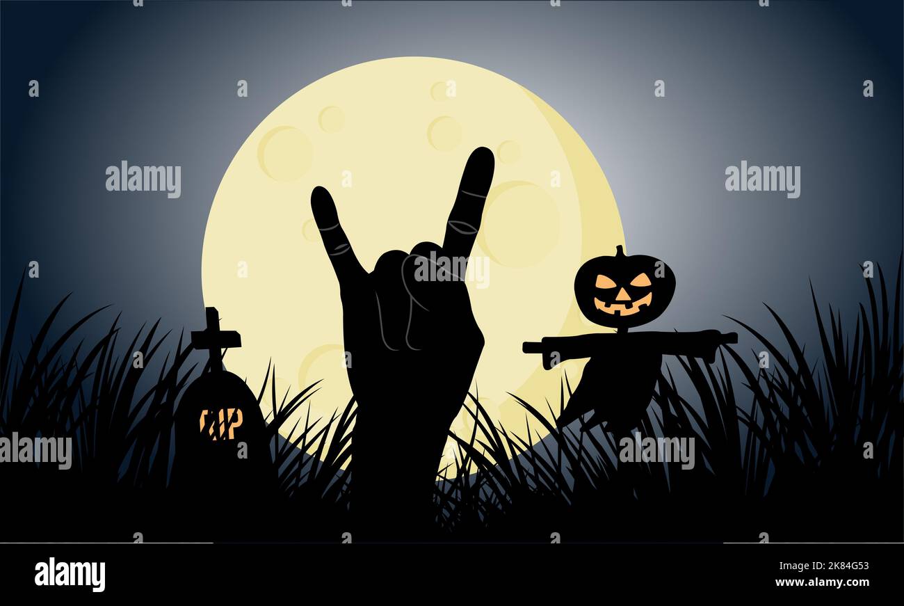 Il simbolo del corno del diavolo emerge dalla tomba. Il simbolo della mano del Diavolo del Rock emerge vicino alla tomba e alla Croce della testa della zucca nella notte di luna piena di Halloween. Foto Stock