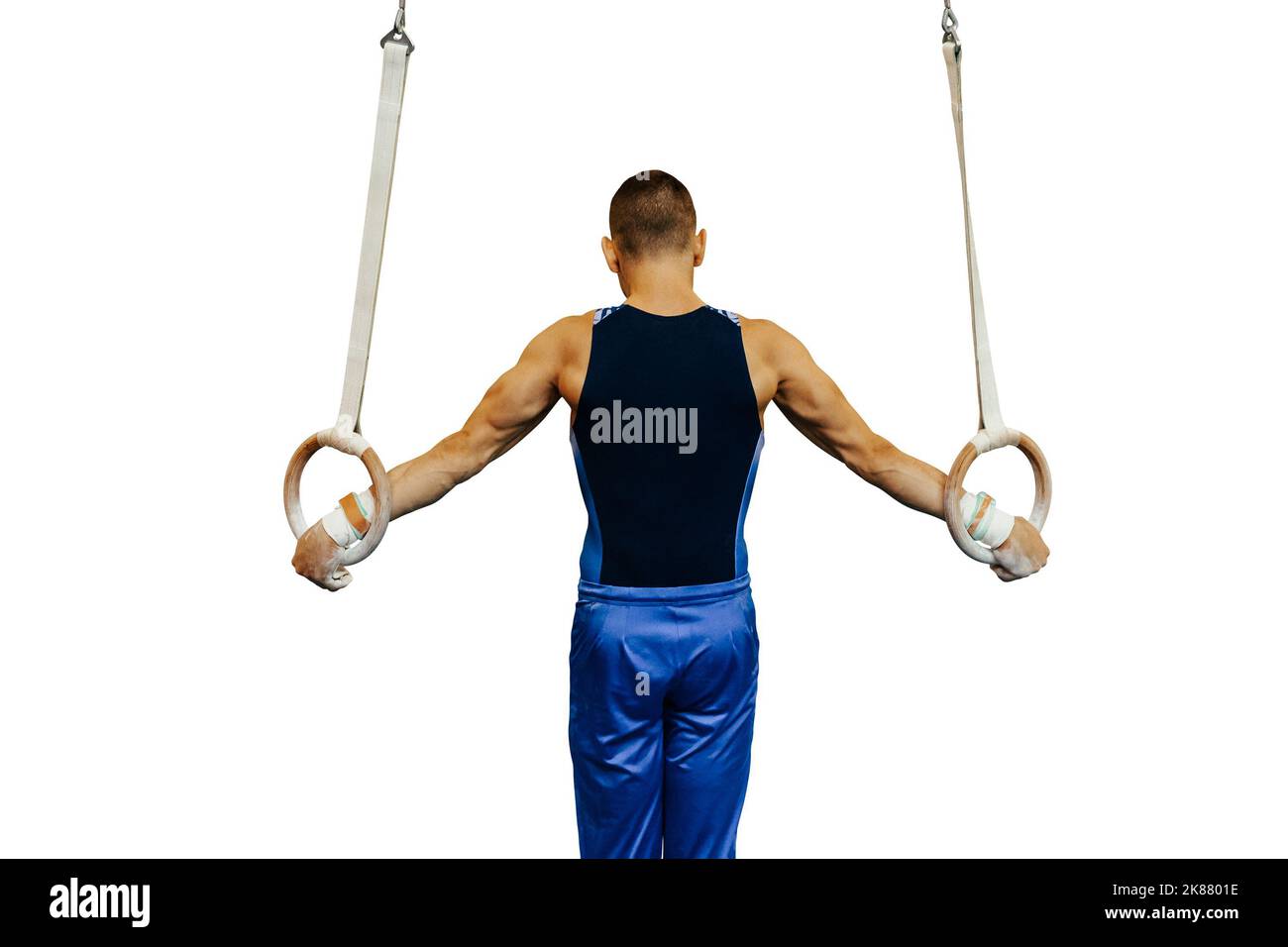 gli anelli di esercitazione dell'atleta di ginnastica ancora Foto Stock