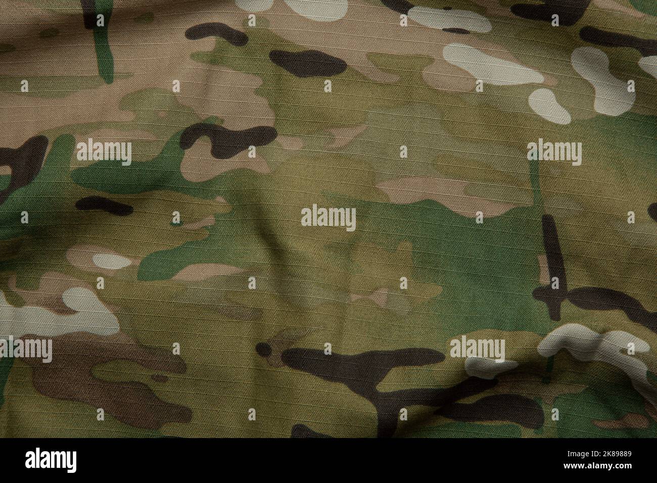 Forza armata multicolore tessuto mimetizzato sfondo texture. Foto Stock