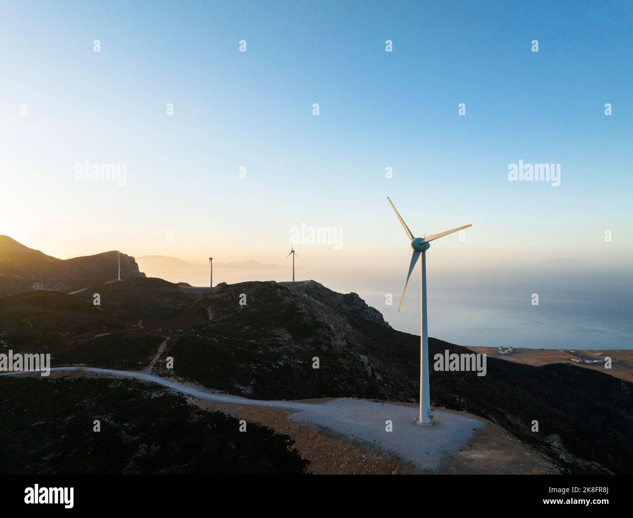 Grecia, Egeo, Kos, turbine eoliche all'alba Foto Stock