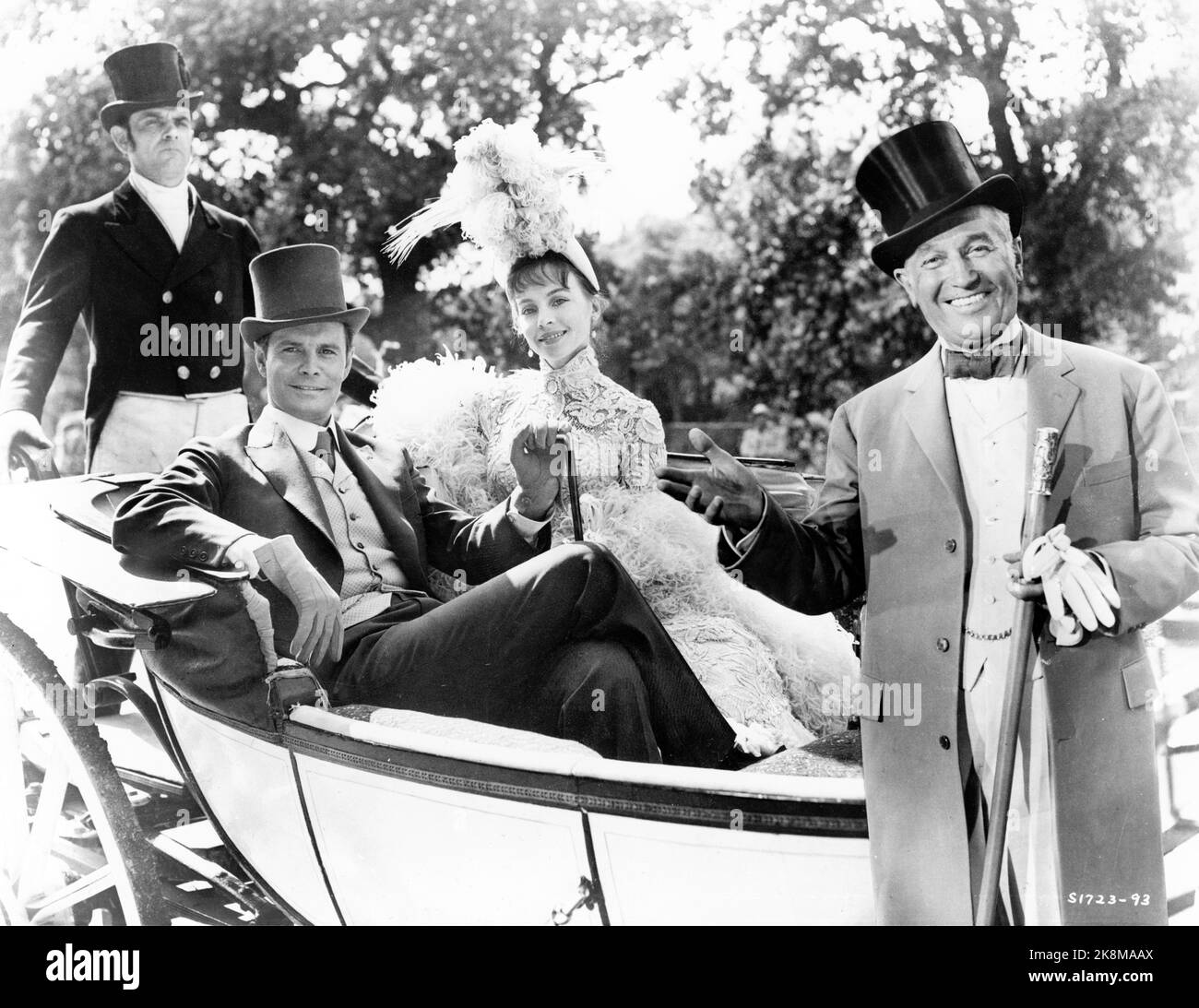 LOUIS JOURDAN LESLIE CARON e MAURICE CHEVALIER in GIGI 1958 regista VINCENTE MINNELLI basato su novella di Colette sceneggiatura / testi Alan jay Lerner musica Frederick Loewe produzione design / costumi Cecil Beaton produttore Arthur liberato Metro Goldwyn Mayer Foto Stock