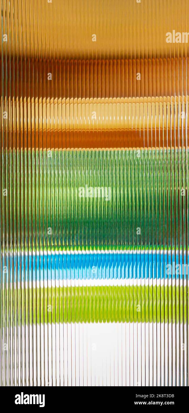 colori attraverso un pannello di vetro a bande Foto Stock
