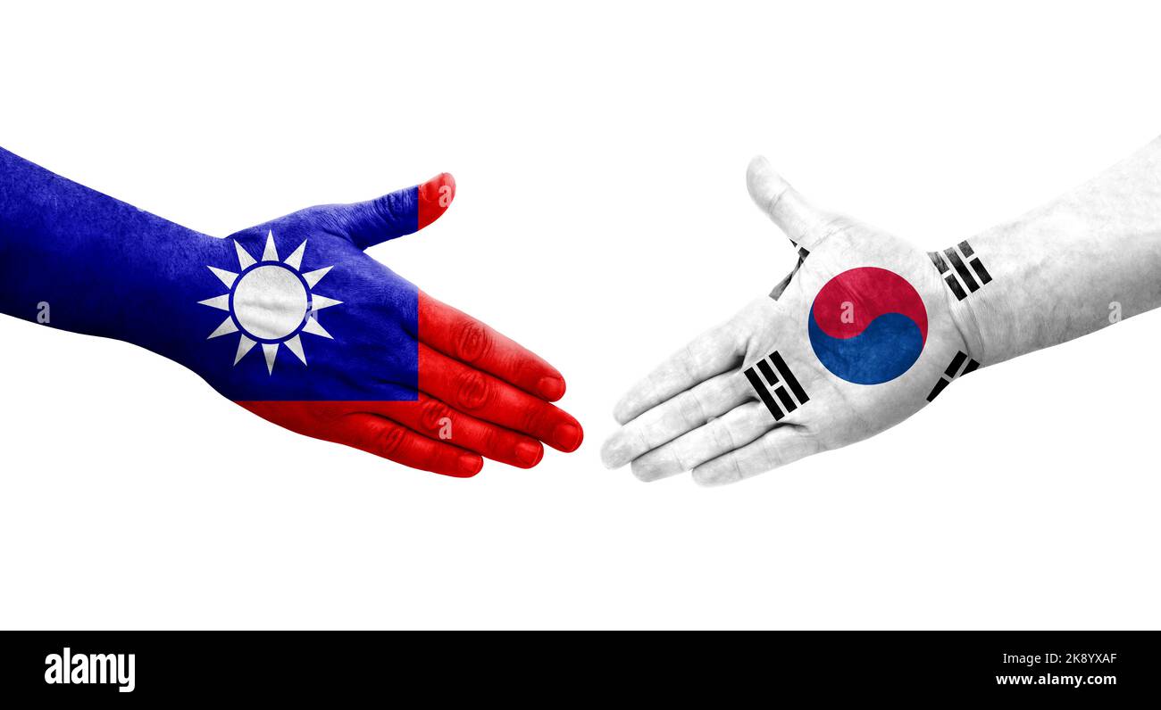 Stretta di mano tra Taiwan e Corea del Sud bandiere dipinte a mano, immagine trasparente isolata. Foto Stock