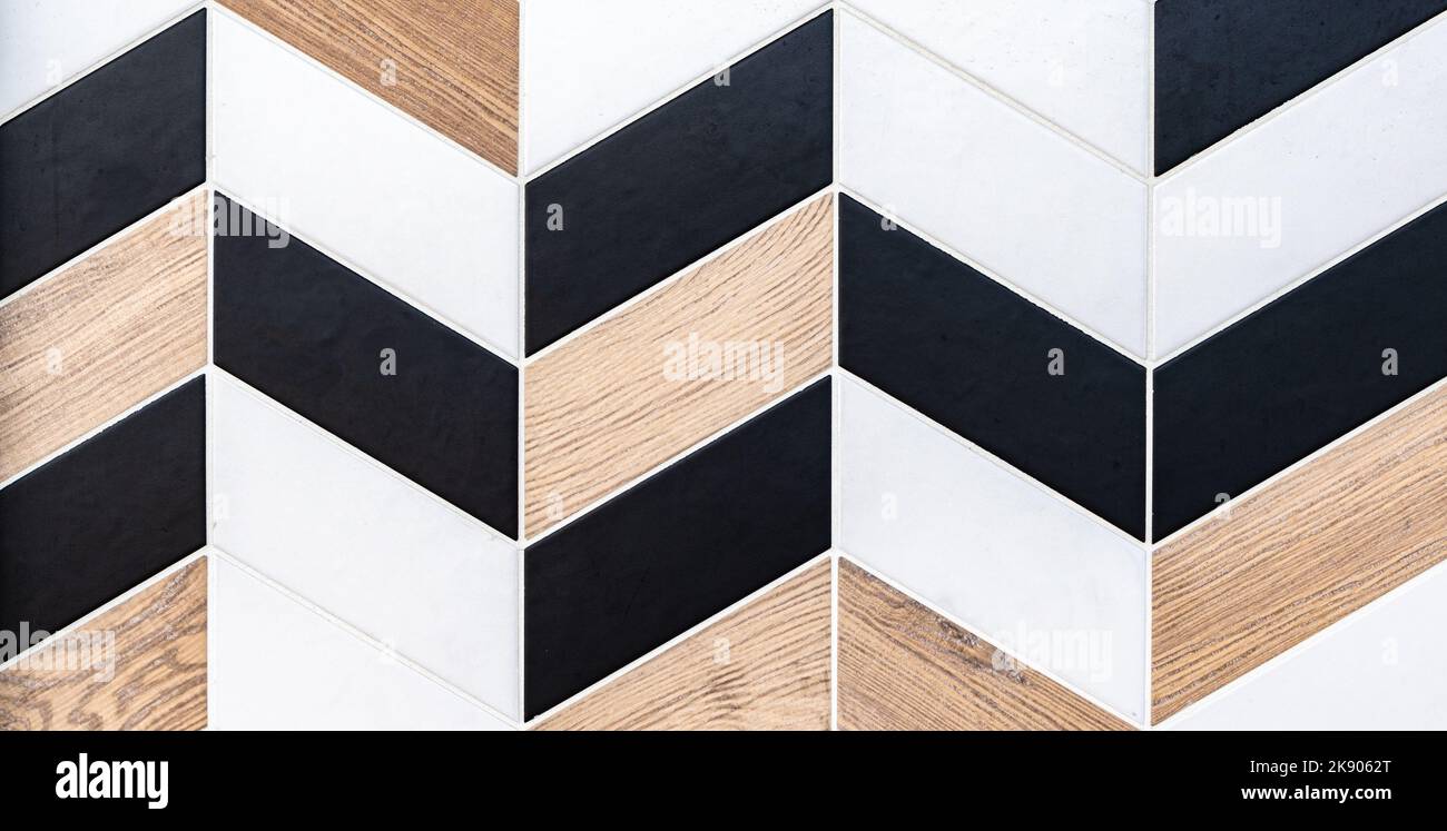 Disegno astratto geometrico con piastrelle a forma di parallelogramma. Foto Stock