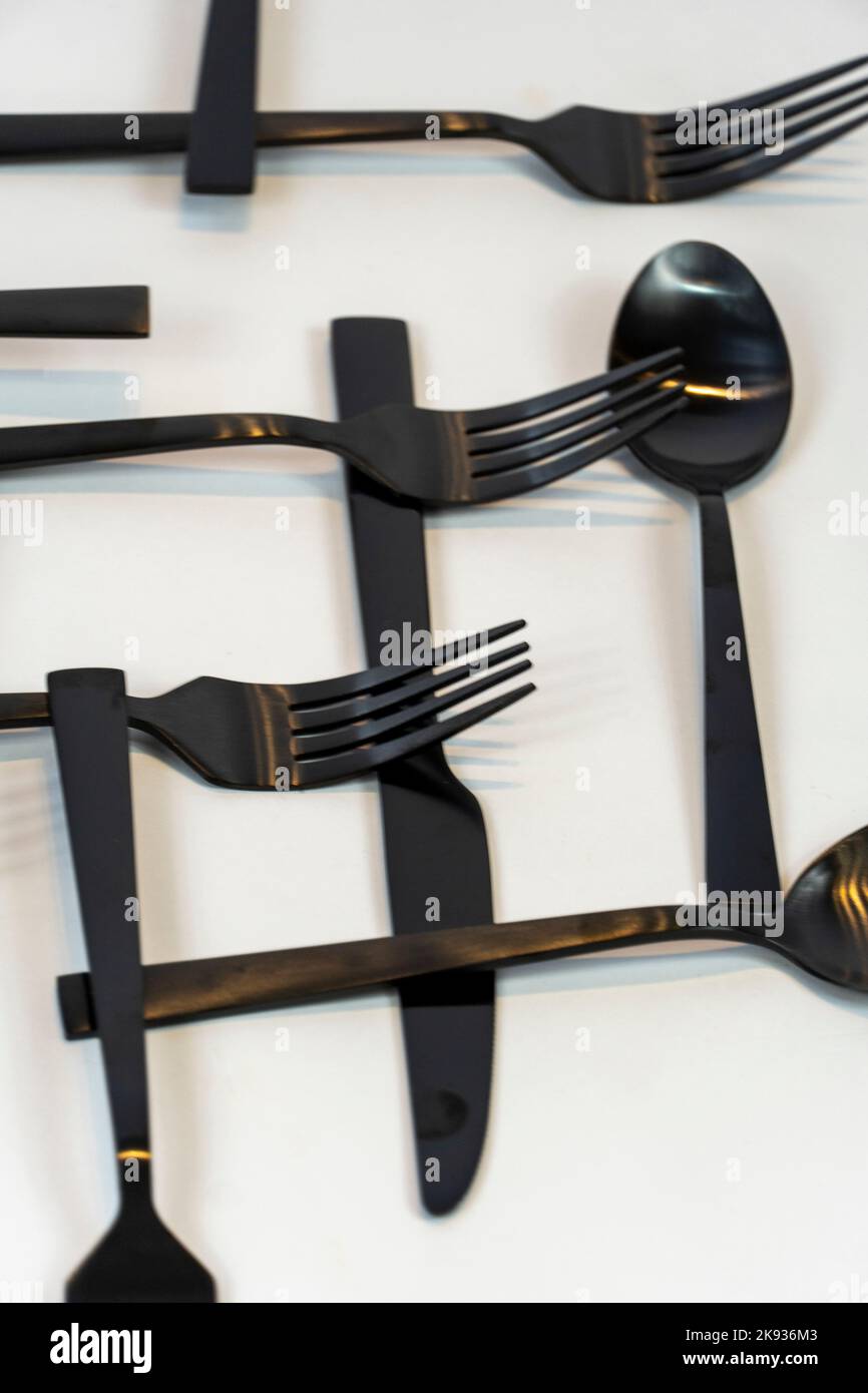 cucchiai da cucina e coltelli in metallo nero, messico Foto Stock