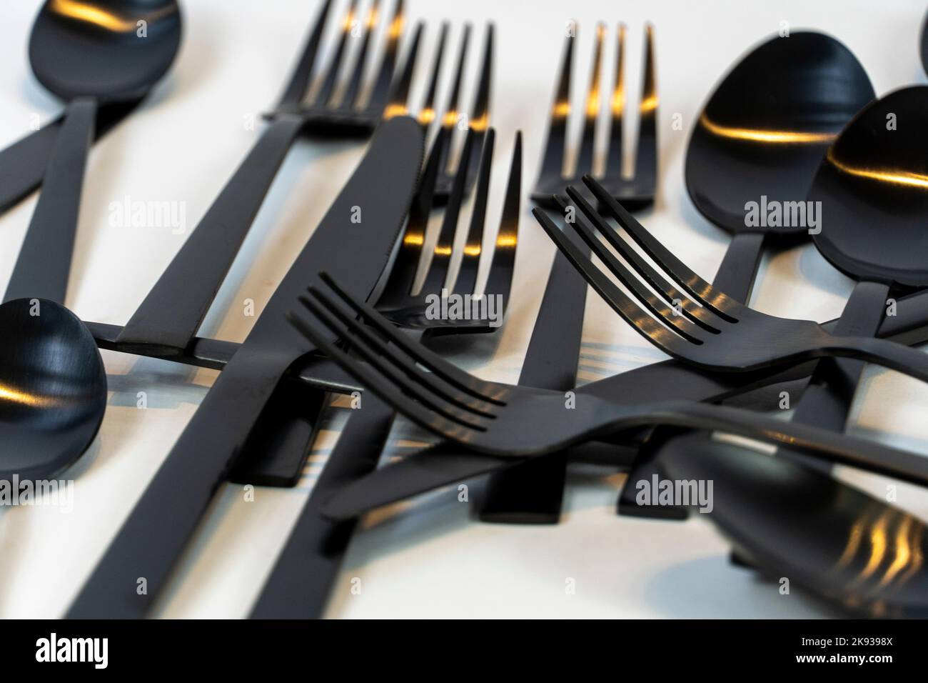 cucchiai da cucina e coltelli in metallo nero, messico Foto Stock