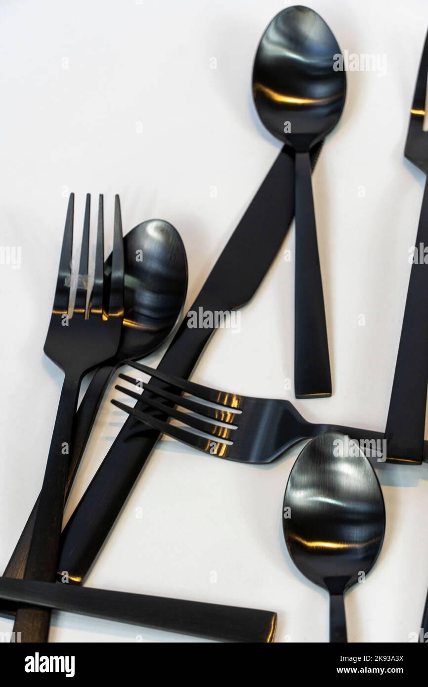 cucchiai da cucina e coltelli in metallo nero, messico Foto Stock