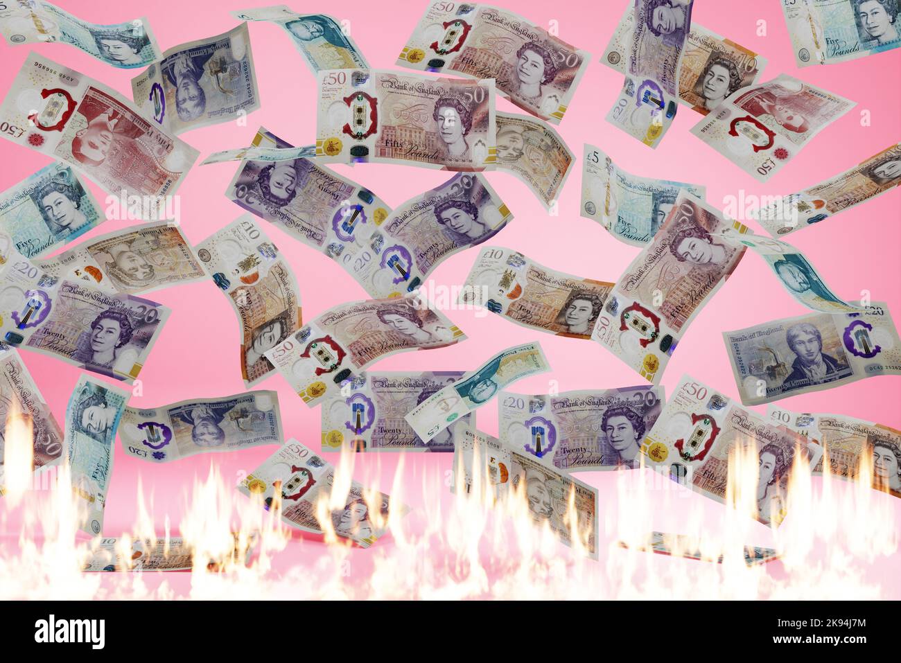 Caduta di denaro britannico caduta della sterlina inglese caduta cambio caduta bruciare concetto di banconote in polimero caduta in fuoco e bruciare Foto Stock