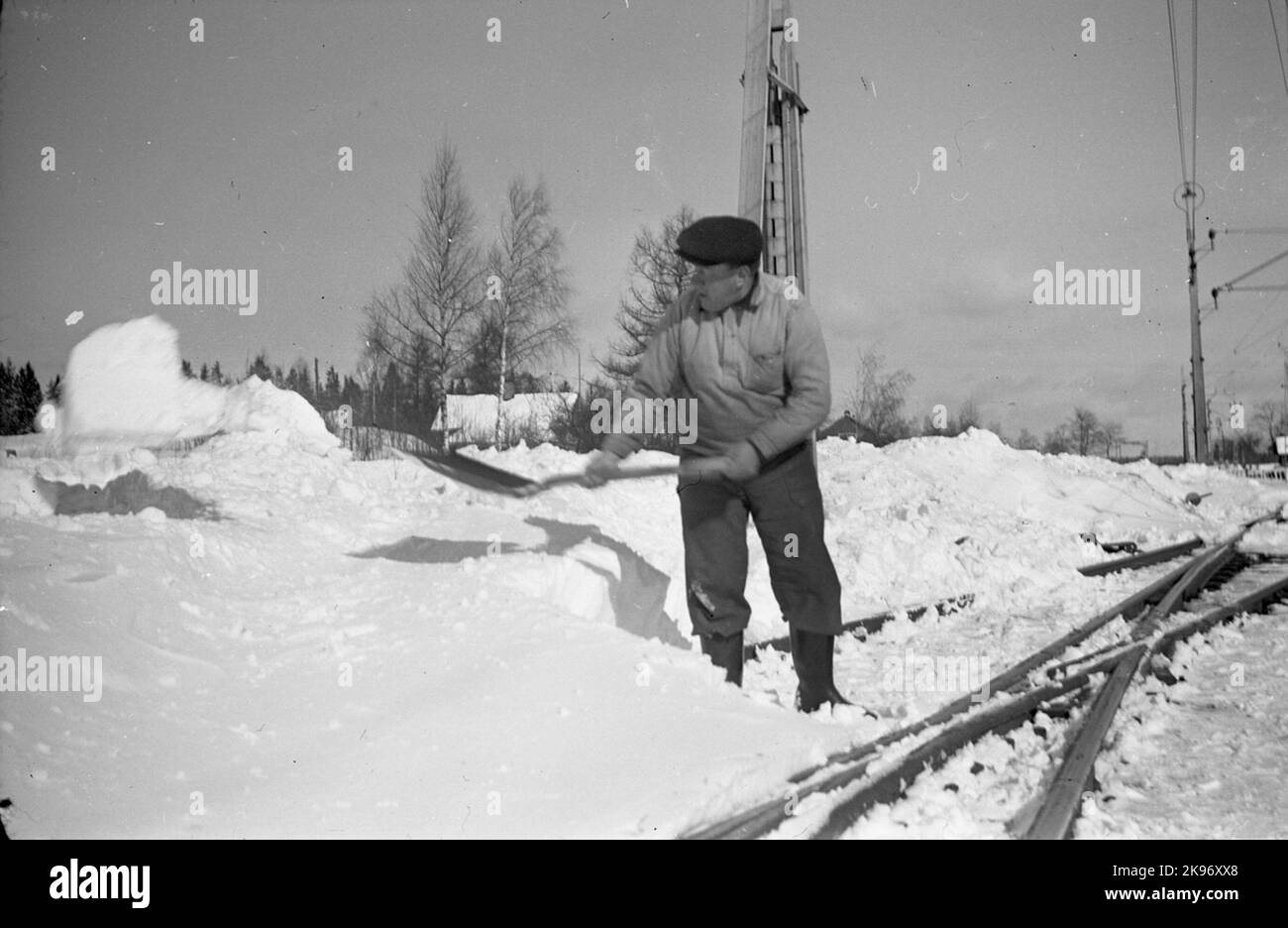 Snowmakers nel cortile Foto Stock