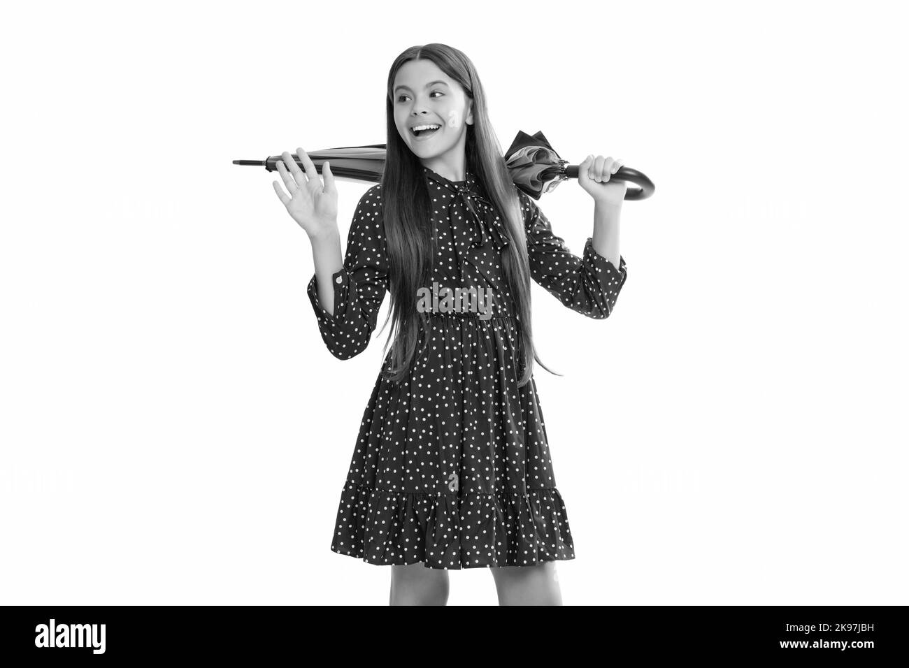 felice bambino tenere multicolore protezione parasolo pioggia isolato su sfondo bianco, autunno Foto Stock