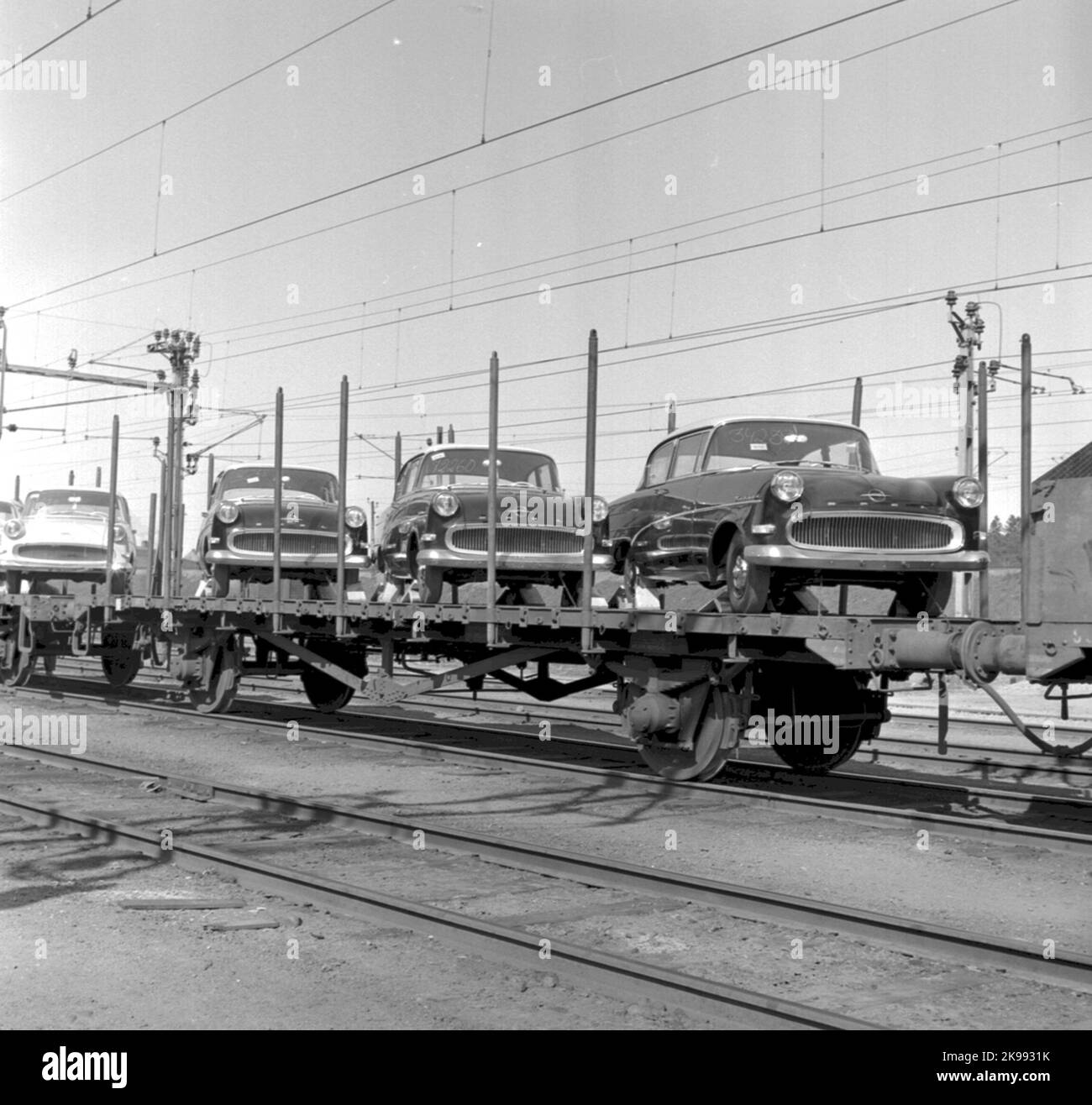 Autovetture caricate su carrozza aperta Foto Stock