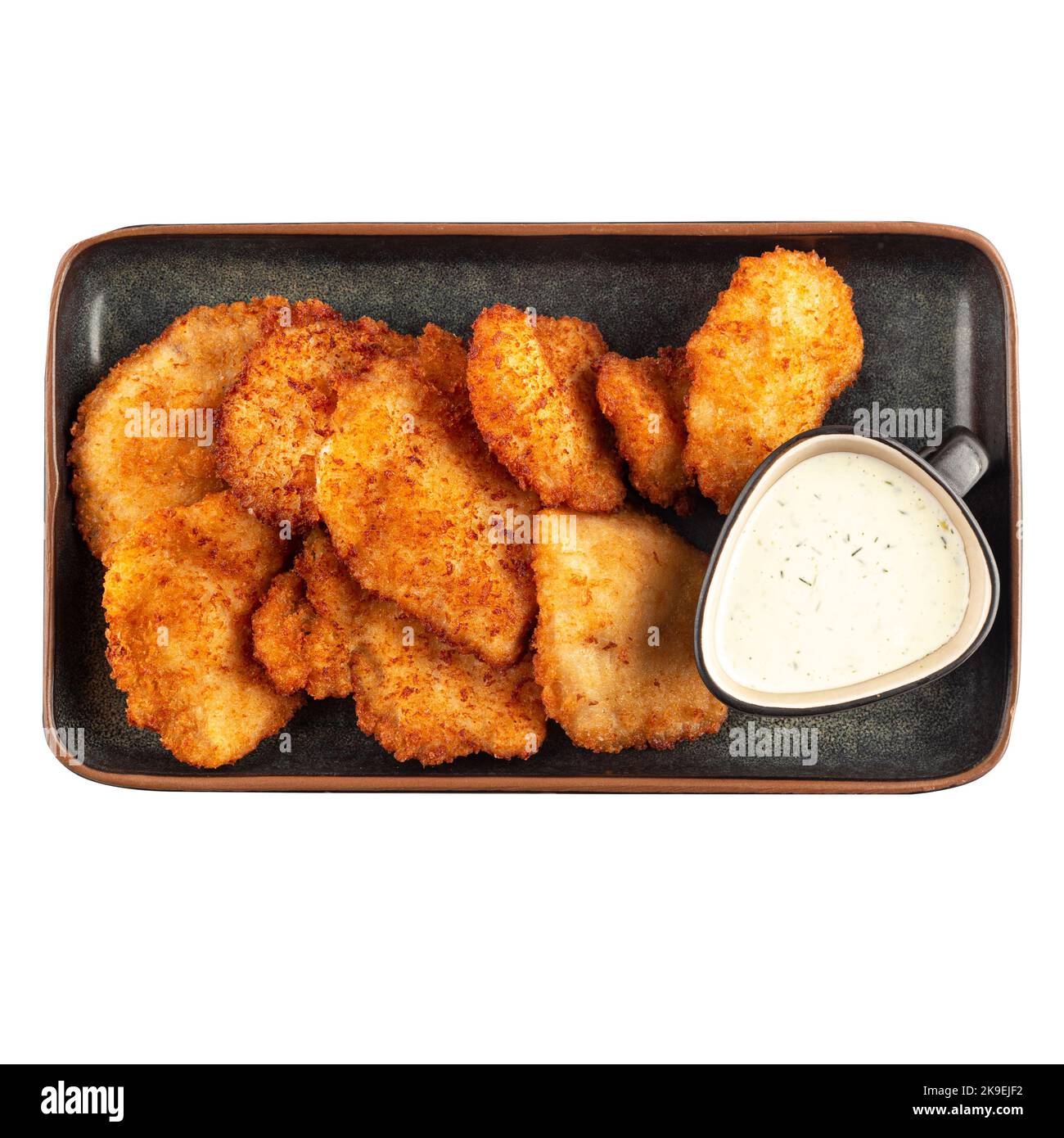 Porzione di bocconcini di pollo fritti con salsa Foto Stock