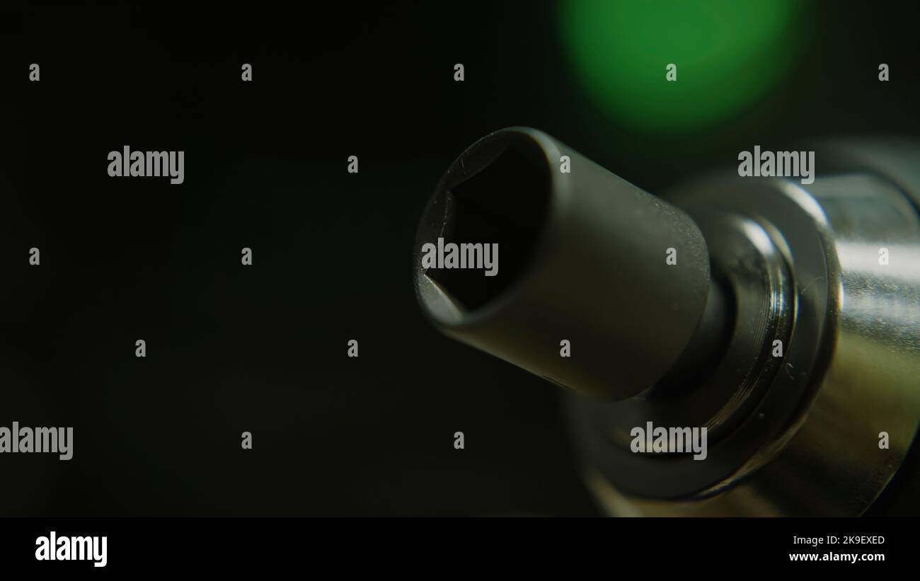 Punta a testa esagonale rotante, macro Extreme close-up, tecnologia e concetto di toolkit Foto Stock