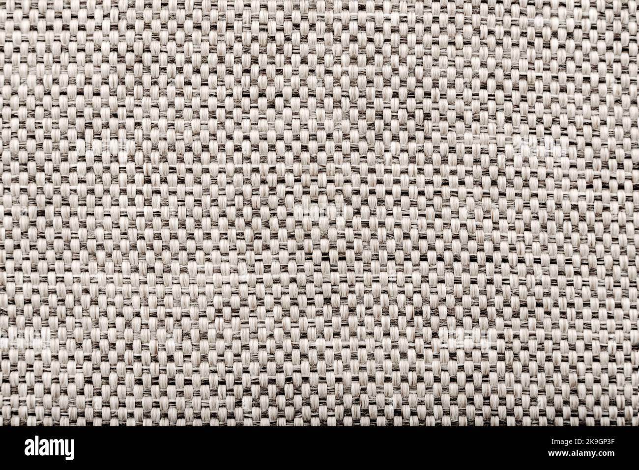 Tessuto grigio chiaro. Materiale con strisce e cicatrici Foto Stock