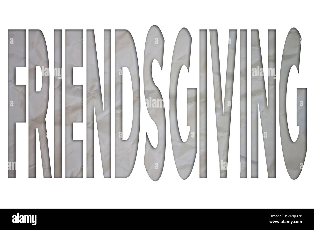 Testo del Fendsgiving con carta bianca strappata e stropicciata su sfondo colorato. Foto Stock