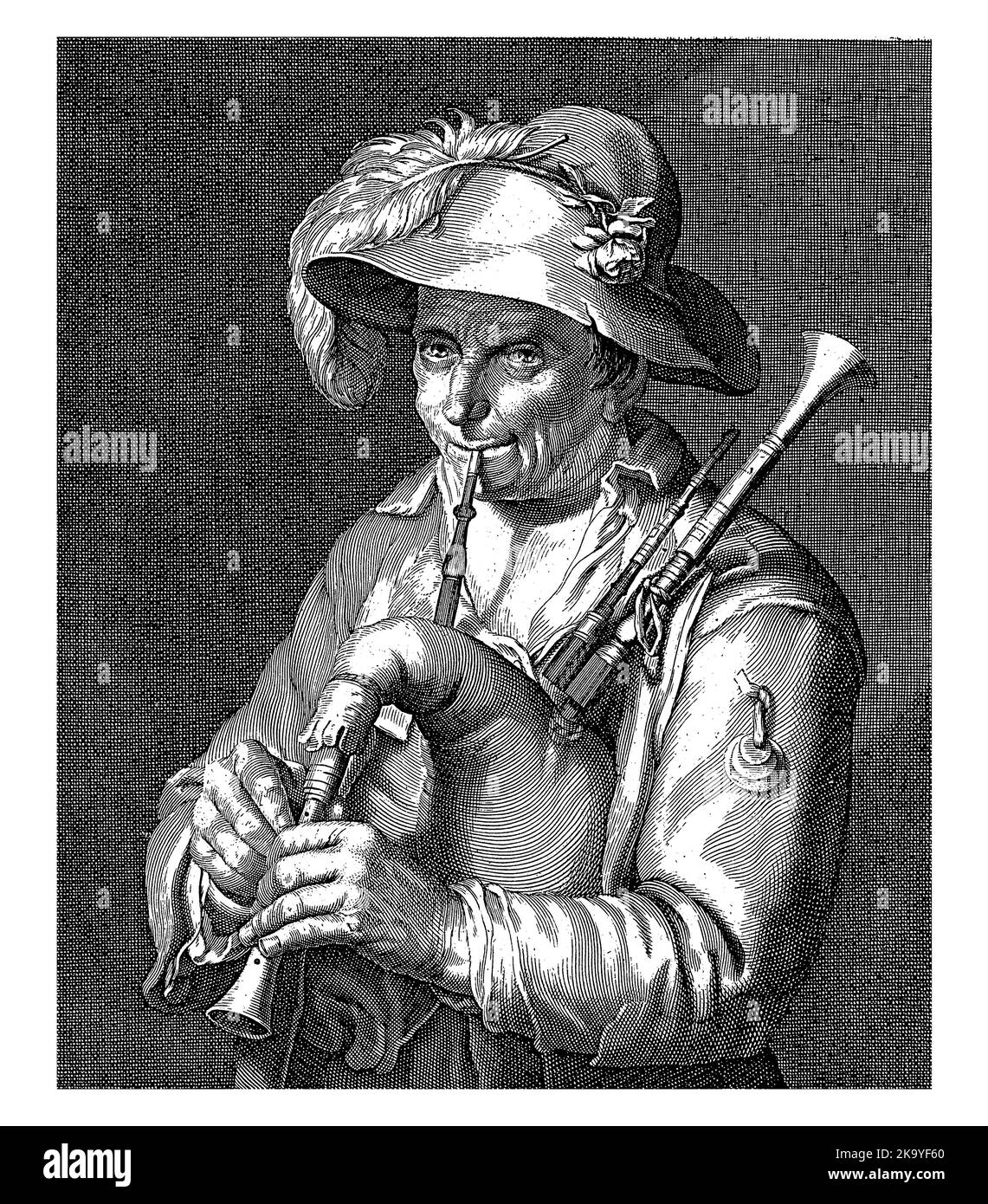 Un contadino con un grande cappello a forma di floppy gioca le cornamuse. Con versetto a due righe in olandese. Foto Stock