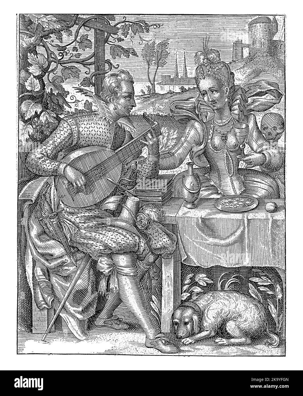 Un giovane uomo e una donna vestiti alla moda sono seduti ad un tavolo, all'aperto. Foto Stock