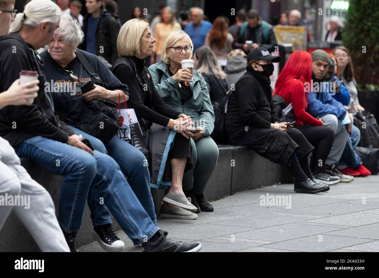Persone a Times Square, Manhattan, New York Foto Stock