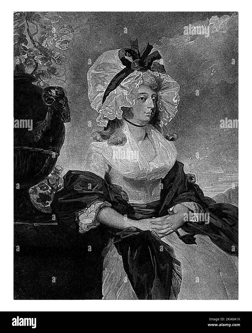 Anne Goddard-Williams Hope in piedi all'aperto accanto a un vaso di fiori. Foto Stock