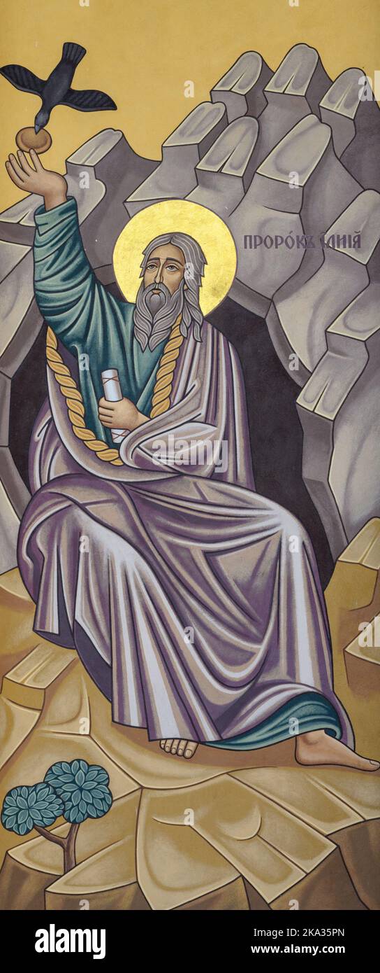 L'icona del profeta Elia essendo nutrita da corvi. Facciata della chiesa greco-cattolica di Sant'Elia a Sečovská Polianka, Slovacchia. Foto Stock